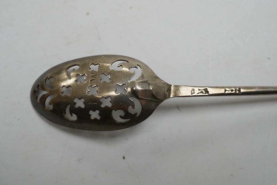 An 18th century silver mote spoon, indistinct maker's mark, with engraved initials, 12.6cm. Condition - fair to good